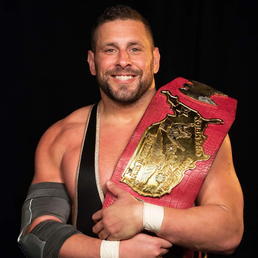 Champion Wrestlerwith Belt Wallpaper