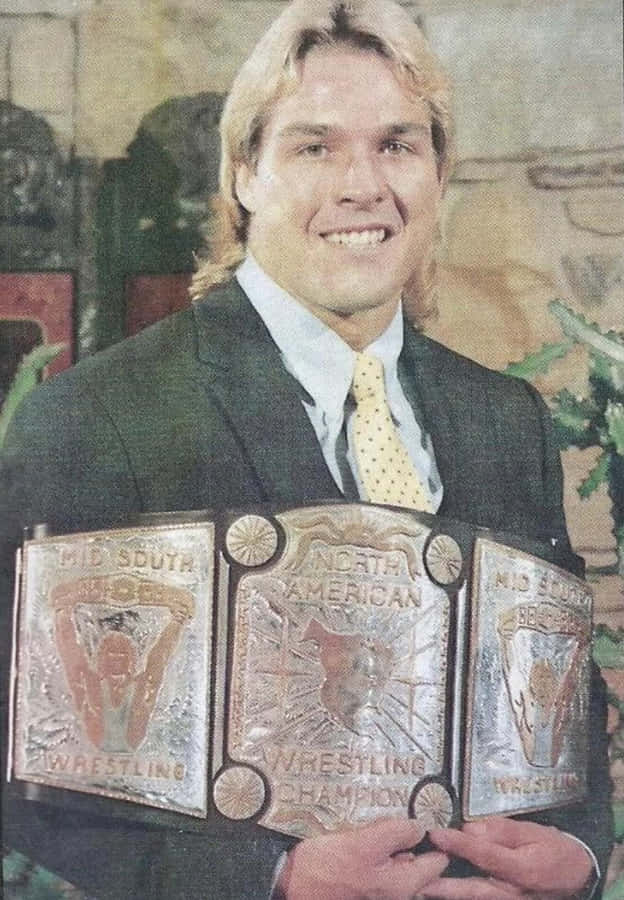 Champion Wrestlerwith Belts Wallpaper