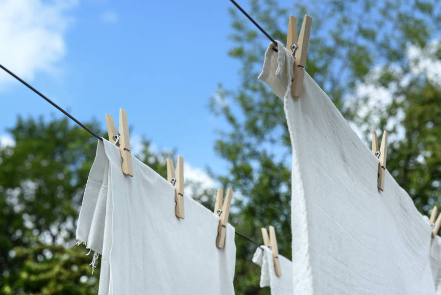 Clothes Line Under The Sun Wallpaper