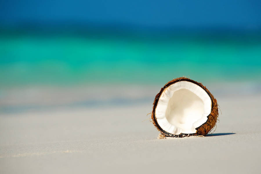 Coconut Fruit On White Sand Wallpaper