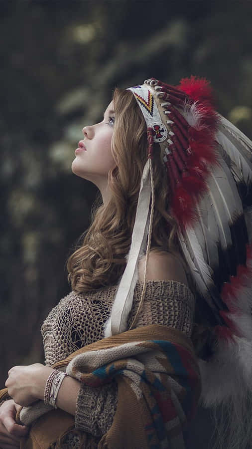 Contemplative Woman In Headdress Wallpaper