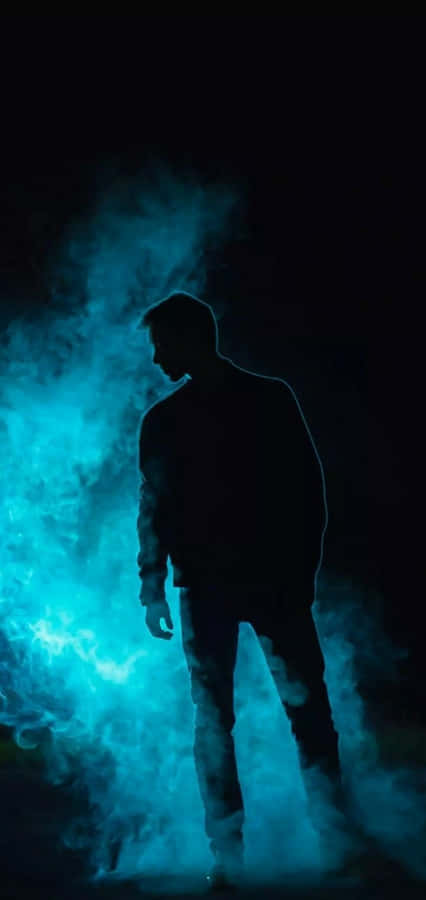 Cool Guy Silhouette Against Smoke Wallpaper
