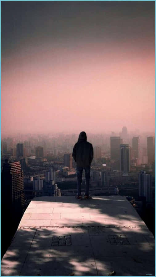 Cool Sad Boy Overlooking The City Wallpaper