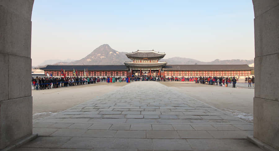 Crowd Of People At Gyeongbokgung Palace Wallpaper
