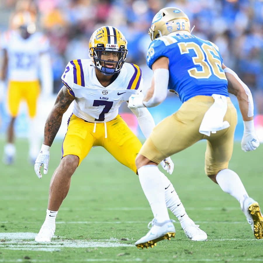 Derek Stingley Jr Guarding Ron Pasquale Wallpaper
