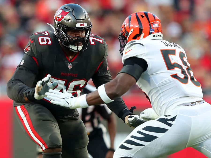 Donovan Smith Defending Joseph Ossai Wallpaper