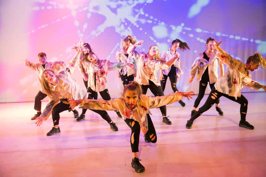 Dynamic Hip Hop Dance Performance Wallpaper