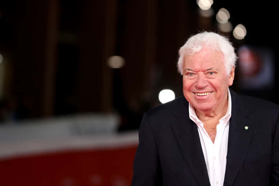 Elderly Gentleman Smiling Red Carpet Wallpaper