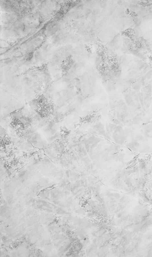 Elegant Marble Macbook On A Stylish Workspace Wallpaper