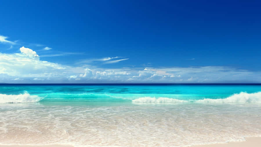 Enjoy The Breathtaking Beauty Of Nature's Ocean With The Latest 4k Ipad Wallpaper