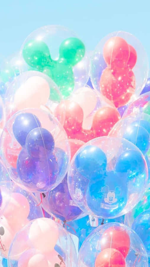 Enjoy The Magical World Of Pastel Colored Disney Wallpaper