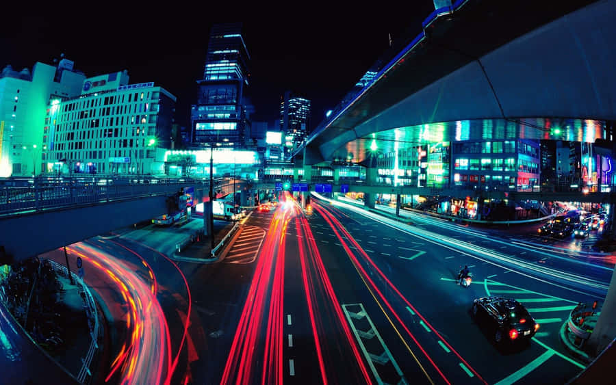 Enjoy The Night Vibes In A Japanese Neon Alleyway Wallpaper