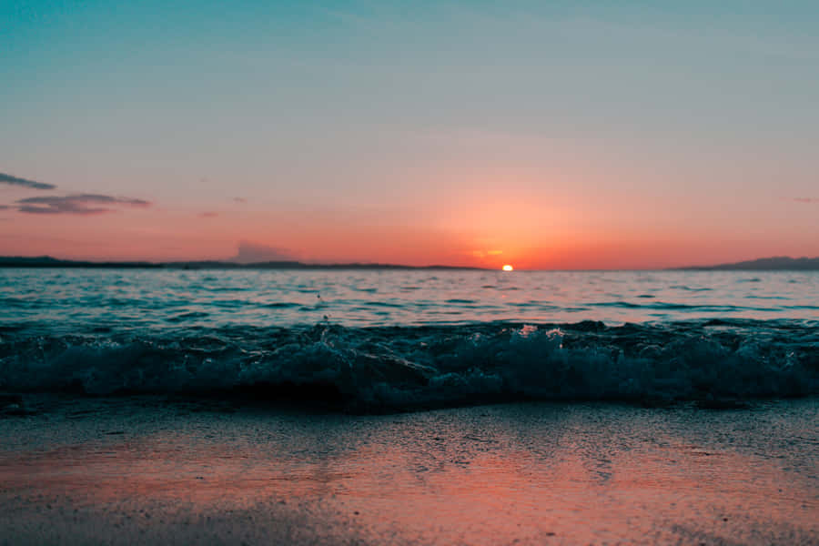 Enjoy The Perfect Beach Sunset Wallpaper