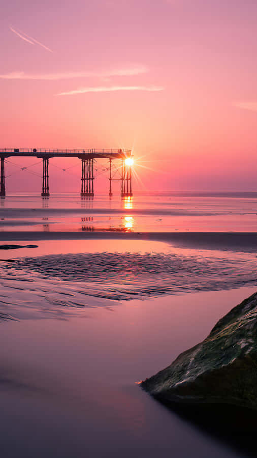 Enjoy The Tranquility Of Life At The Beach. Wallpaper