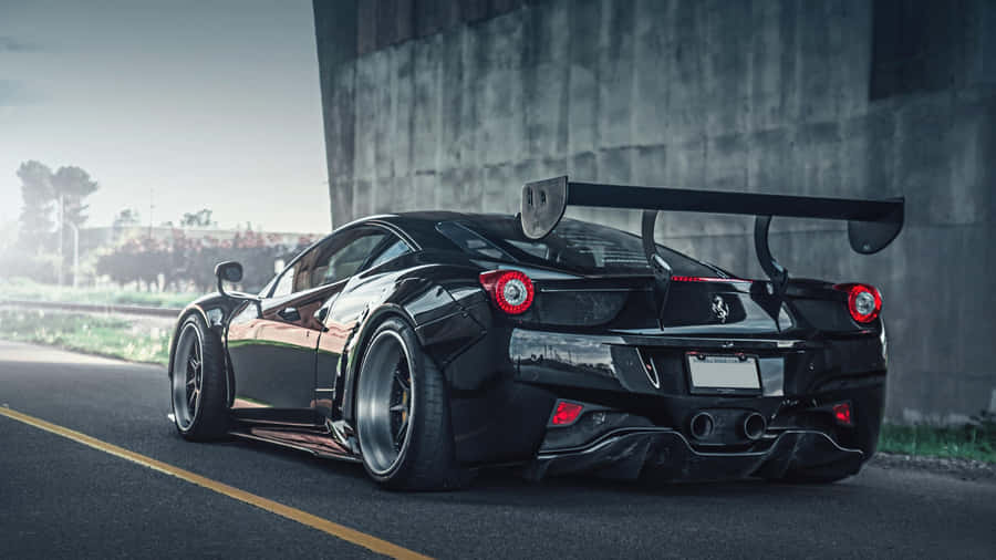 Enjoy The Ultimate Driving Experience In A Cool Ferrari Wallpaper