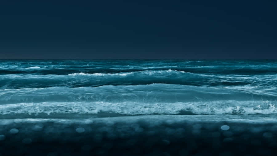 Enjoy The View From The Beach And Explore The Horizon With A 4k Ipad Wallpaper