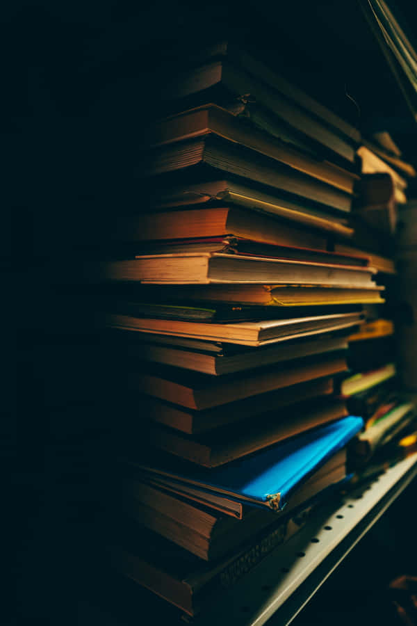 Enjoy Your Favorite Books On The Go With Your Iphone Wallpaper