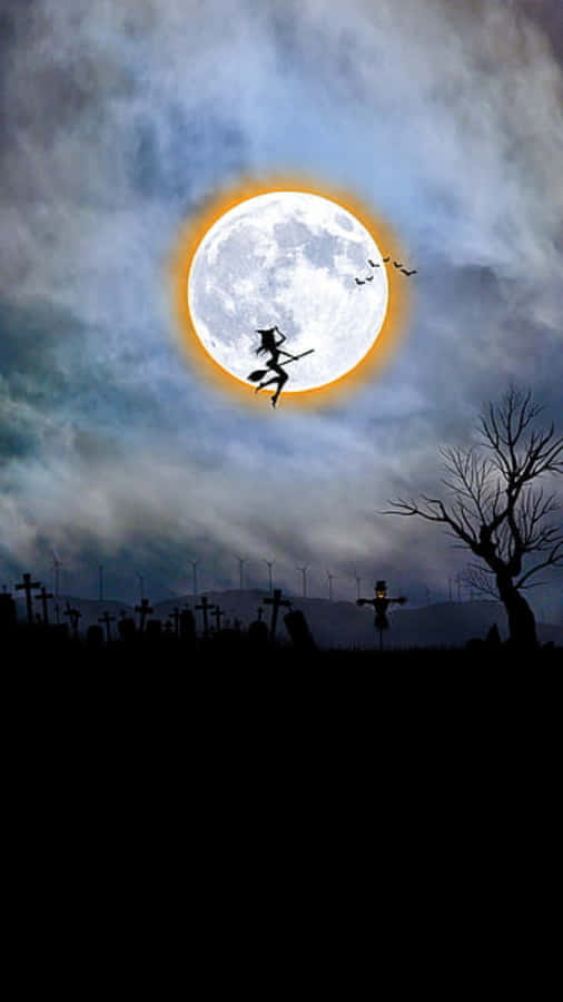 Enjoy Your Halloween Festivities With A Mischievous Witch Wallpaper