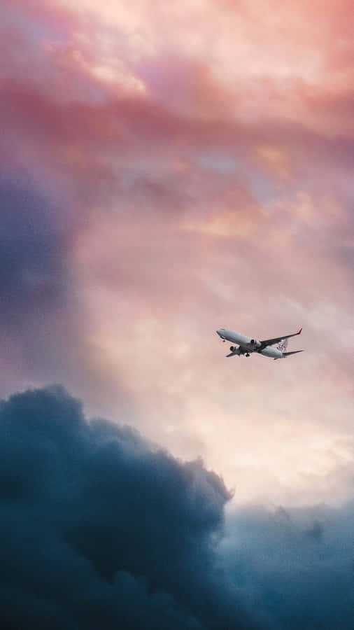 Enjoy Your Travels With An Iphone In Hand Wallpaper