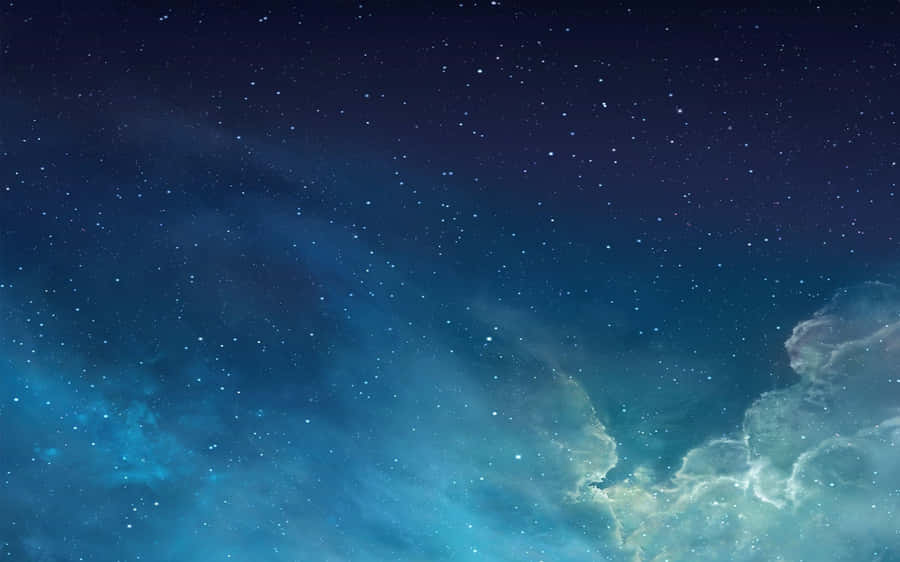 Explore The Intersections Of Green And Blue In This Heavenly Galaxy Wallpaper
