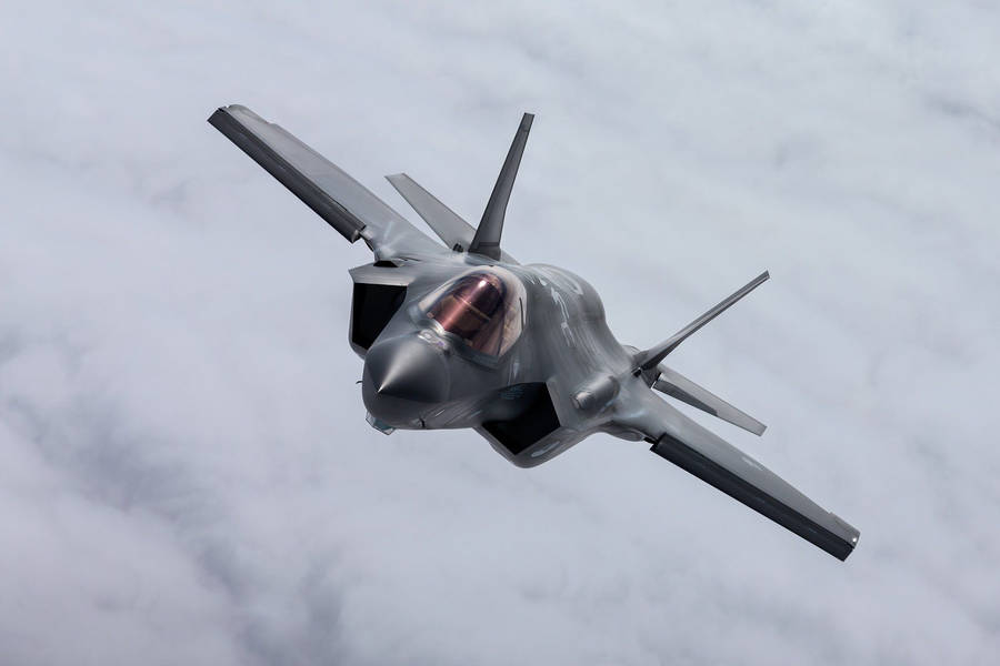 F-35a Fighter Jet In Action Wallpaper