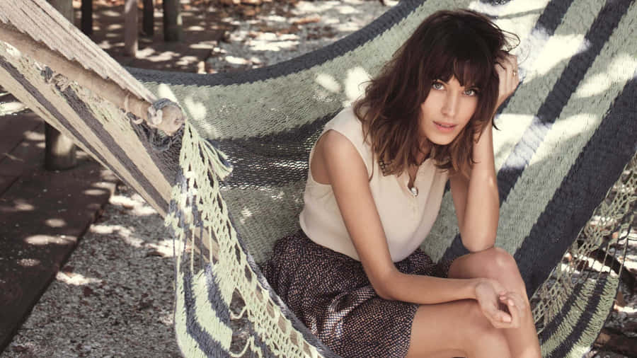 Fashion Icon Alexa Chung In Casual Chic Attire Wallpaper