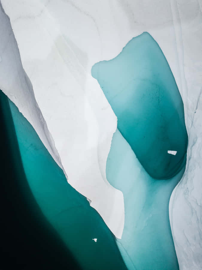 Feel Flawless & Fashionable With A Turquoise Iphone. Wallpaper