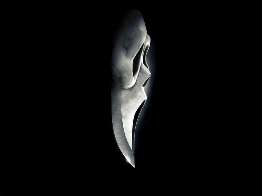 Feel The Power Of The Newest Iphone With The Scream Iphone Design. Wallpaper