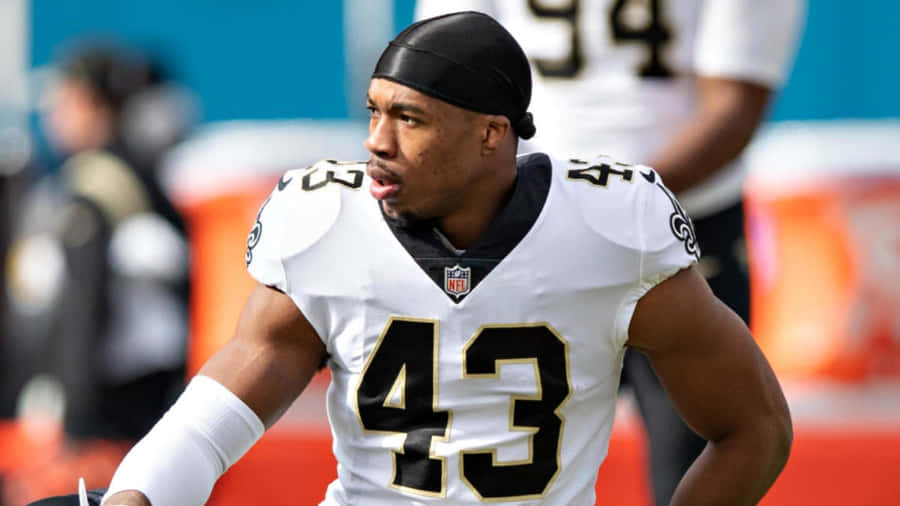 Focused Football Player Number43 Wallpaper