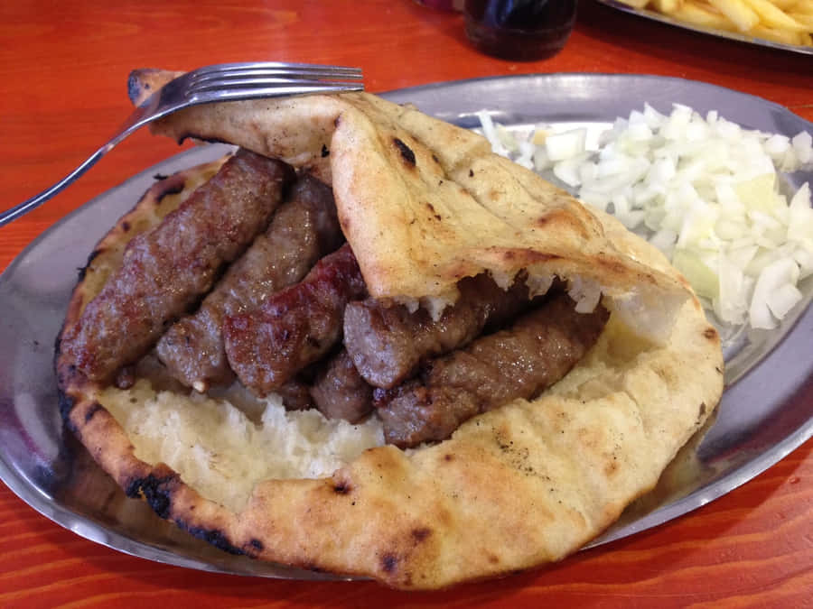 Folded Pita Bread With Ćevapi Sausages Wallpaper