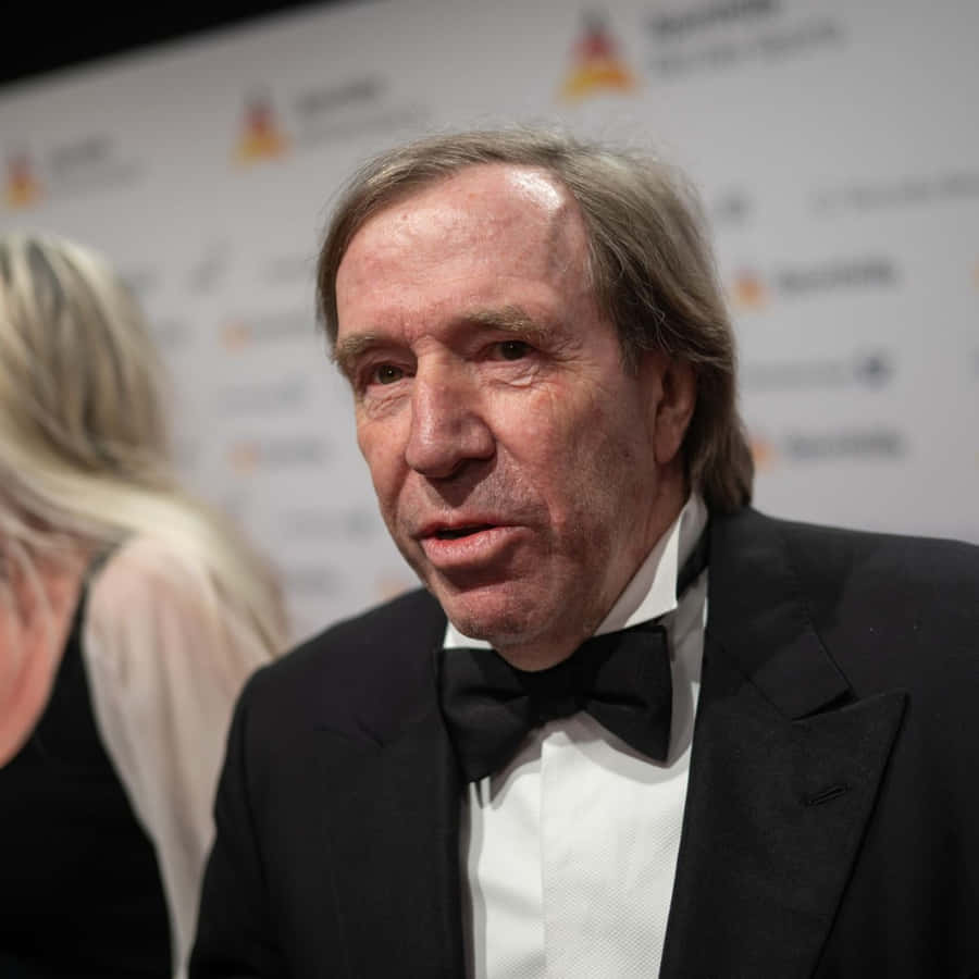 Former Football Athlete Günter Netzer Ball Des Sports Event Wallpaper
