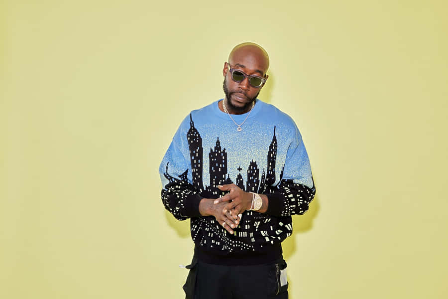 Freddie Gibbs Yellow Backdrop Wallpaper
