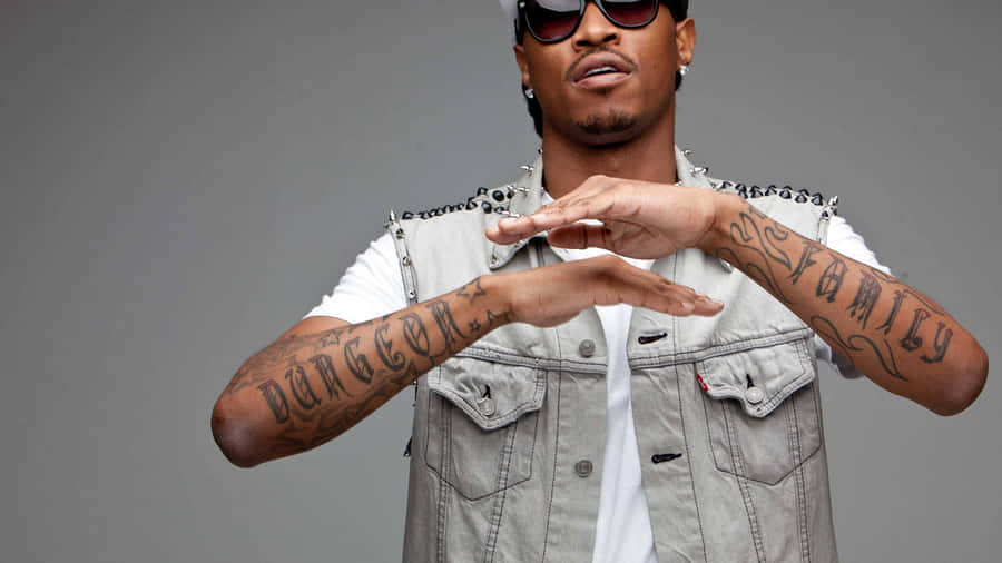 Future Rapper Pfp With Arm Tattoos Wallpaper