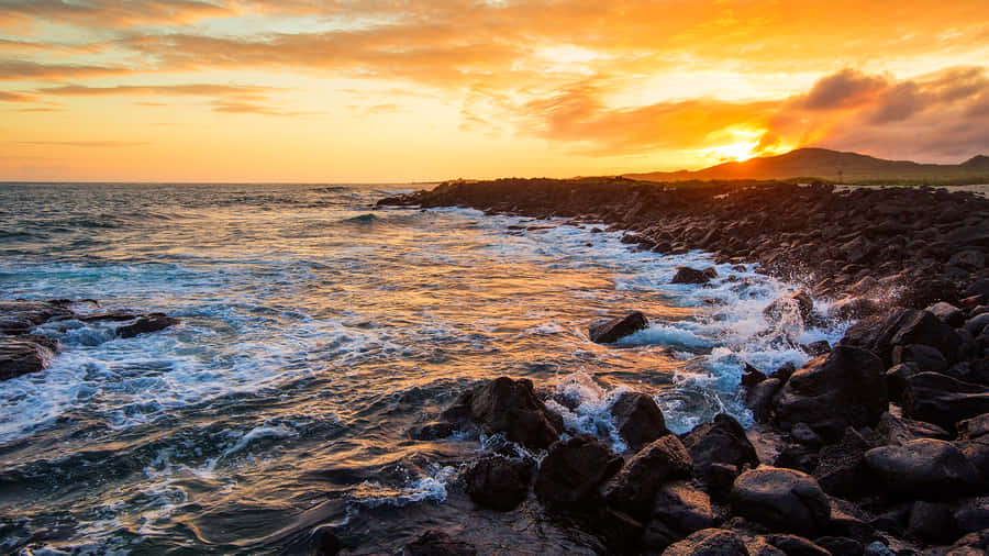 Galapagos Sunset Over Volcanic Rocks Wallpaper