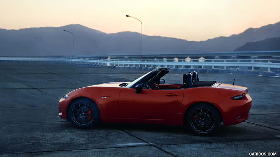 Get Ready For An Unforgettable Driving Experience With Mazda Mx-5 Miata Wallpaper