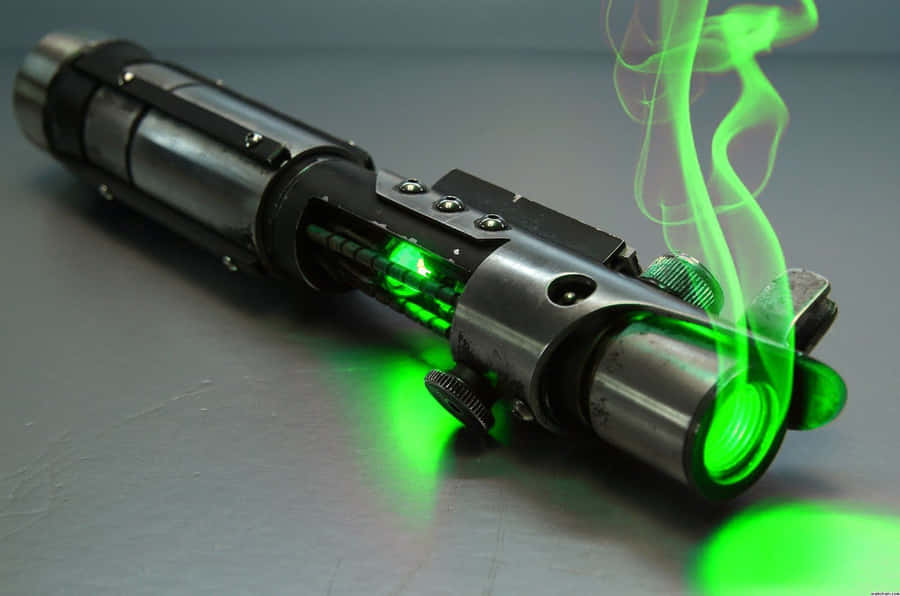 Get Ready To Fight With A Star Wars Lightsaber Wallpaper
