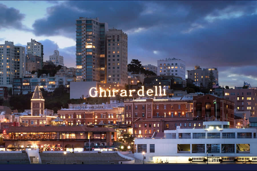 Ghiradelli Square Beneath Cloudy Night Sky Wallpaper