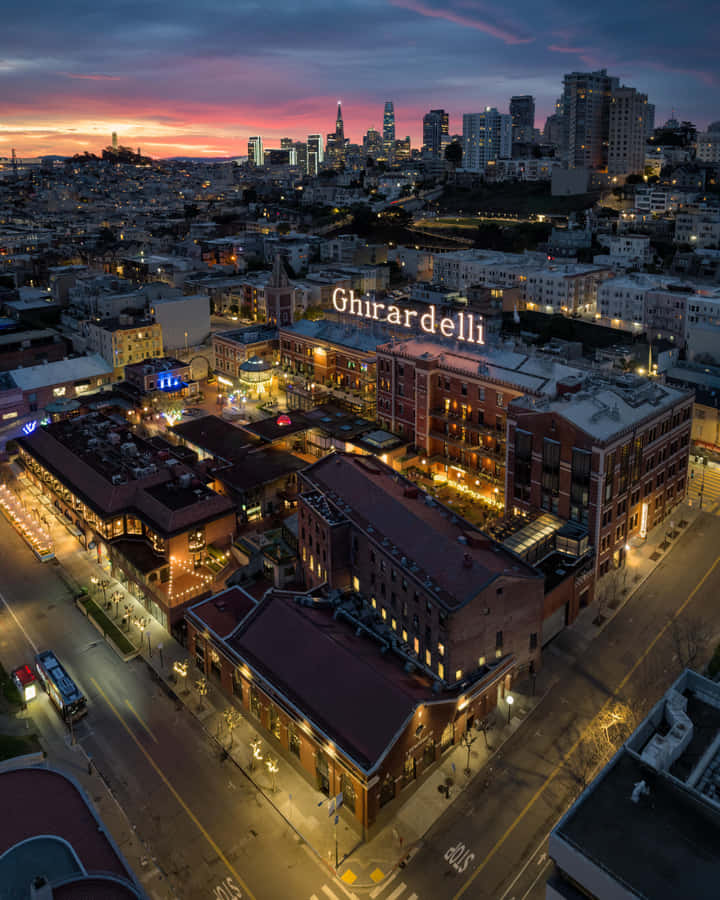 Ghirardelli Square Illuminated At Night Wallpaper