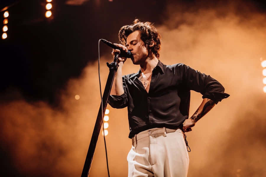 Harry Styles Is Ready For The Day With His Sleek Laptop Wallpaper