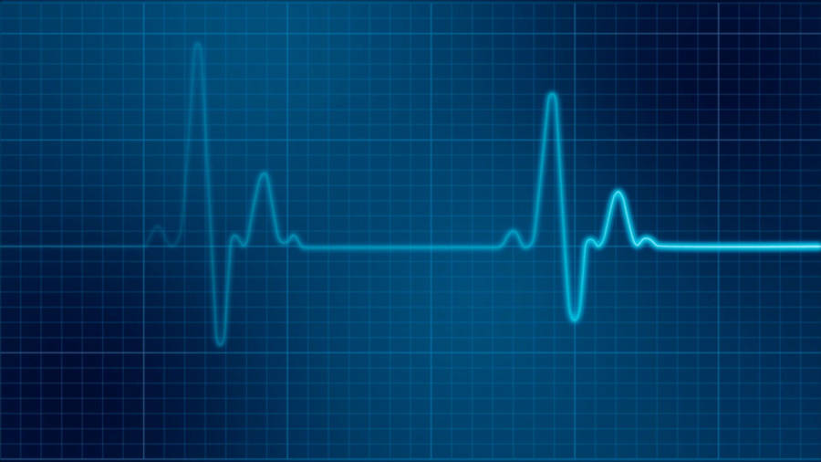 Healthcare Professional Monitoring An Electrocardiogram Wallpaper