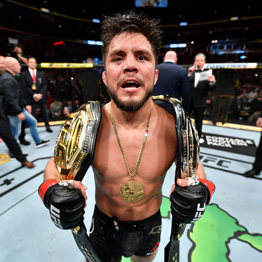 Henry Cejudo's Triumphant Victory Over Marlon Moraes At Ufc 238 Wallpaper