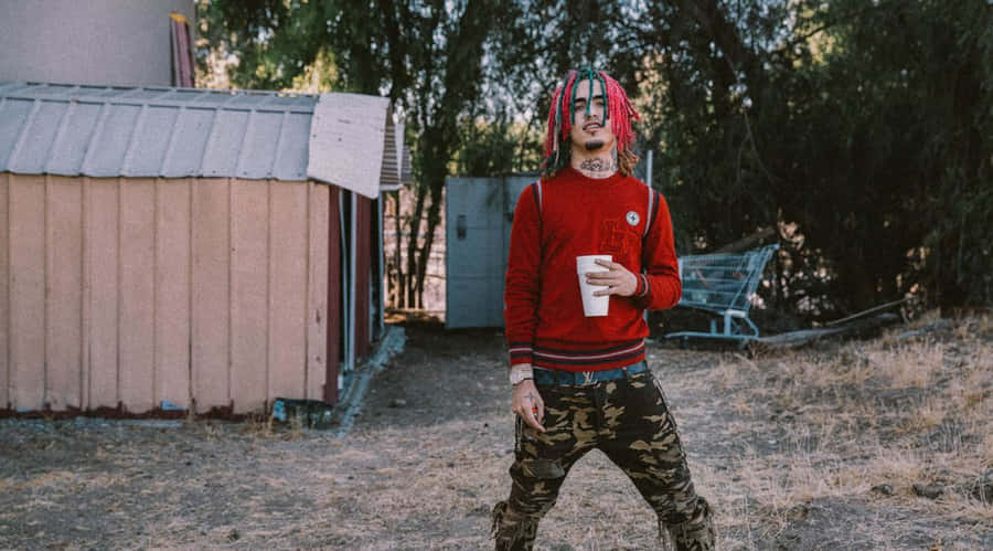 Hip-hop Artist, Lil Pump, Strikes A Pose Outside. Wallpaper