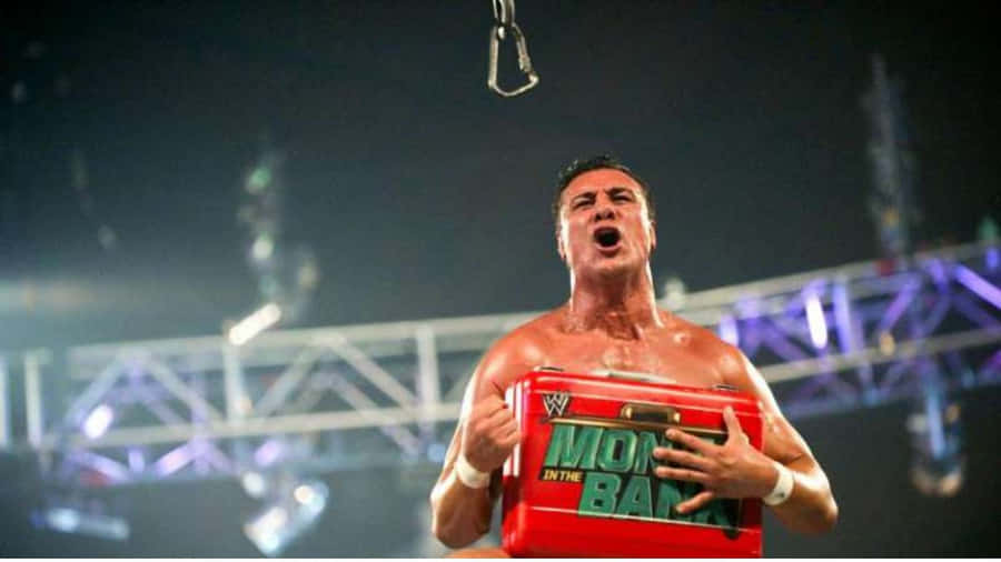 Iconic Alberto Del Rio Celebrating His Win At Money In The Bank Wallpaper