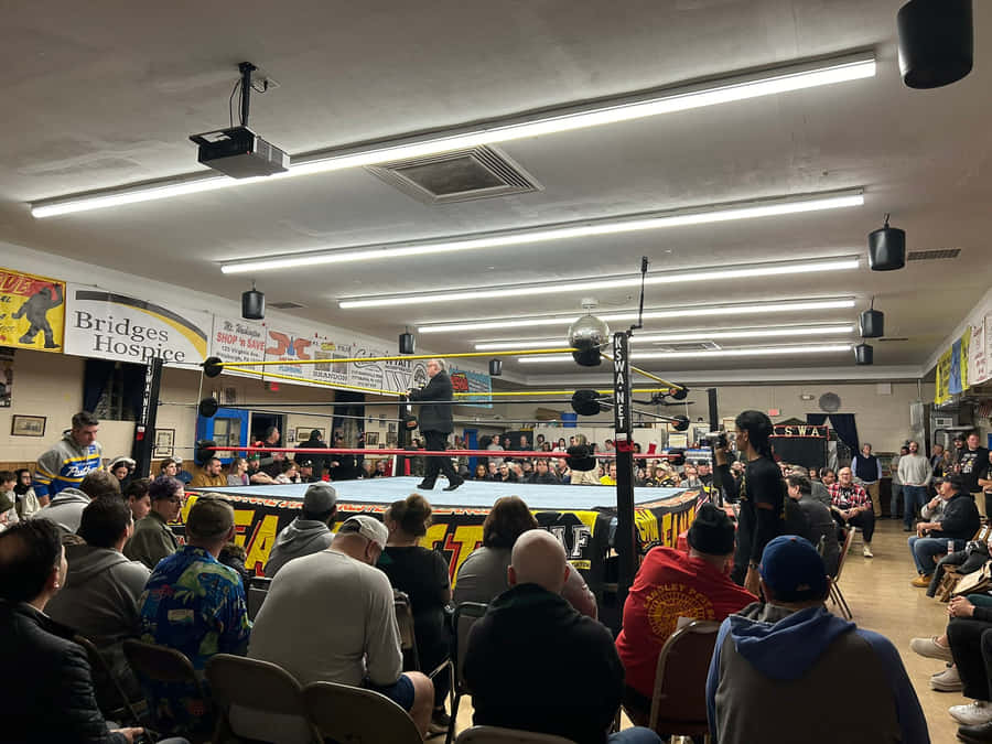 Indoor Wrestling Event Atmosphere Wallpaper