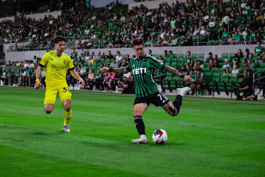 Intense Soccer Match Action Wallpaper