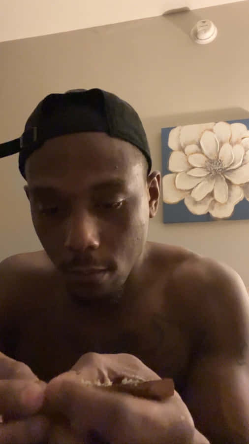 Jamahal Hill Looking Confident In Black Cap Wallpaper