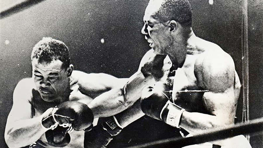 Jersey Joe Walcott Hits Joe Louis Wallpaper