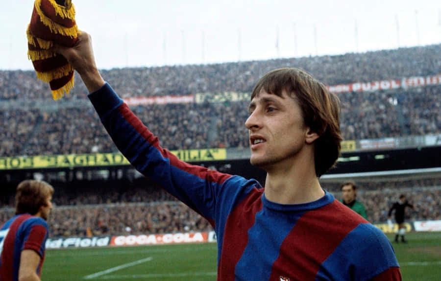 Johan Cruyff Holding Fc Barcelona Flag Wallpaper
