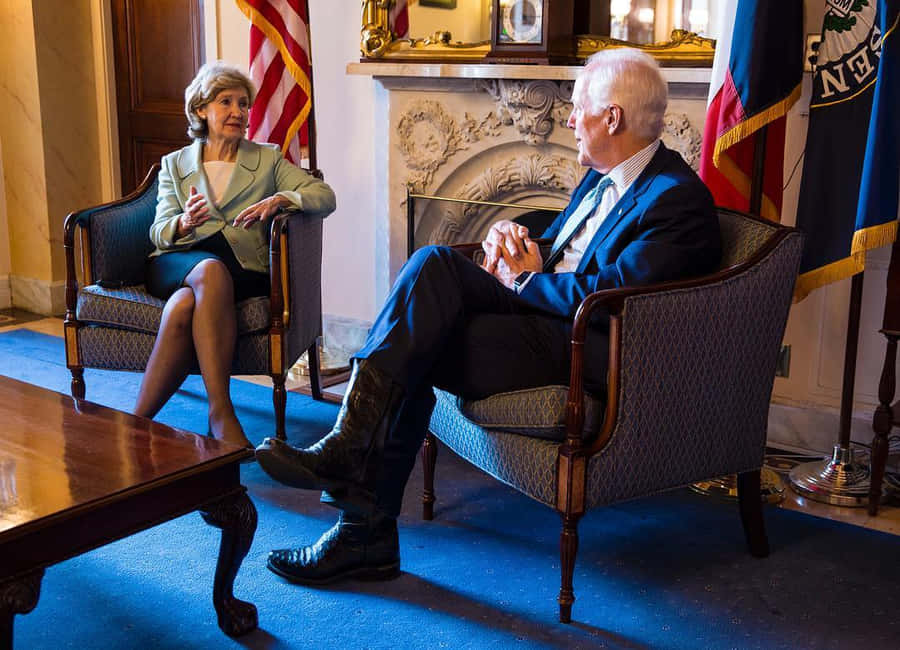 John Cornyn Cross-legged Wallpaper