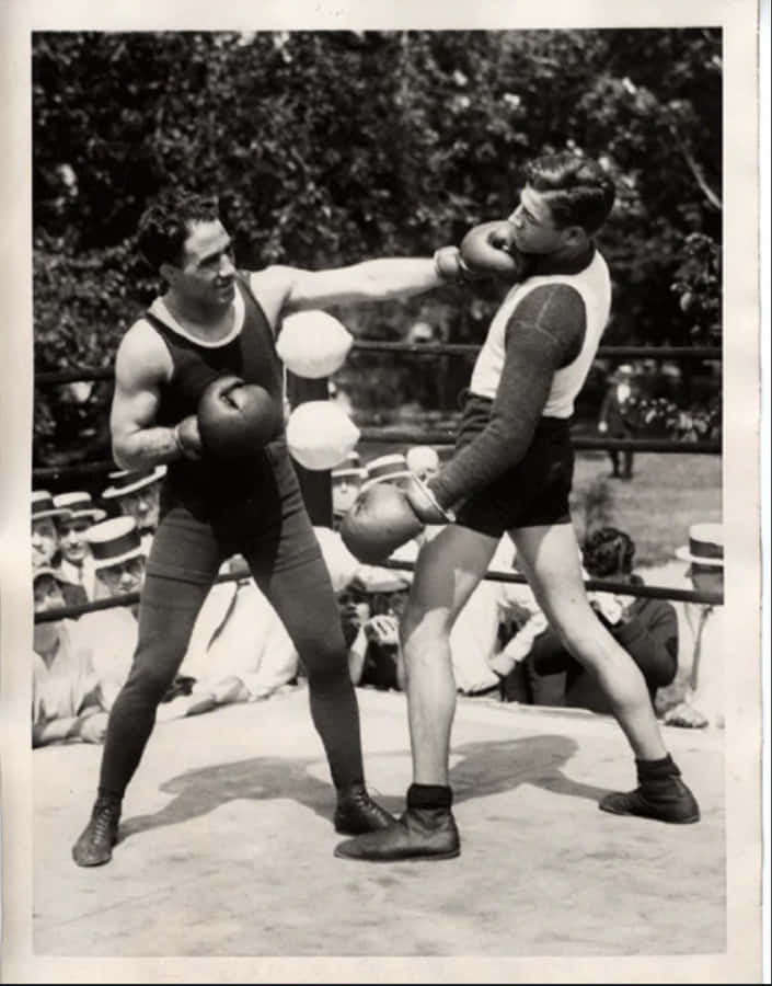 Johnny Dundee Tries To Do Uppercut Blow Wallpaper